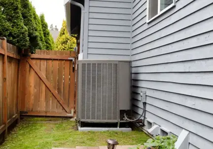 An outdoor central air conditioning unit
