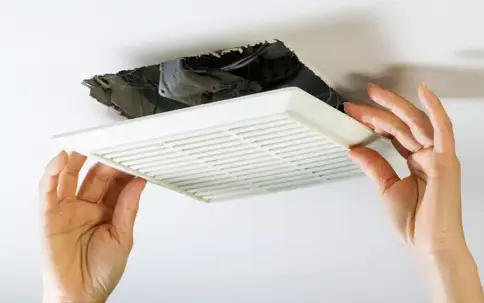 A white square vent cover